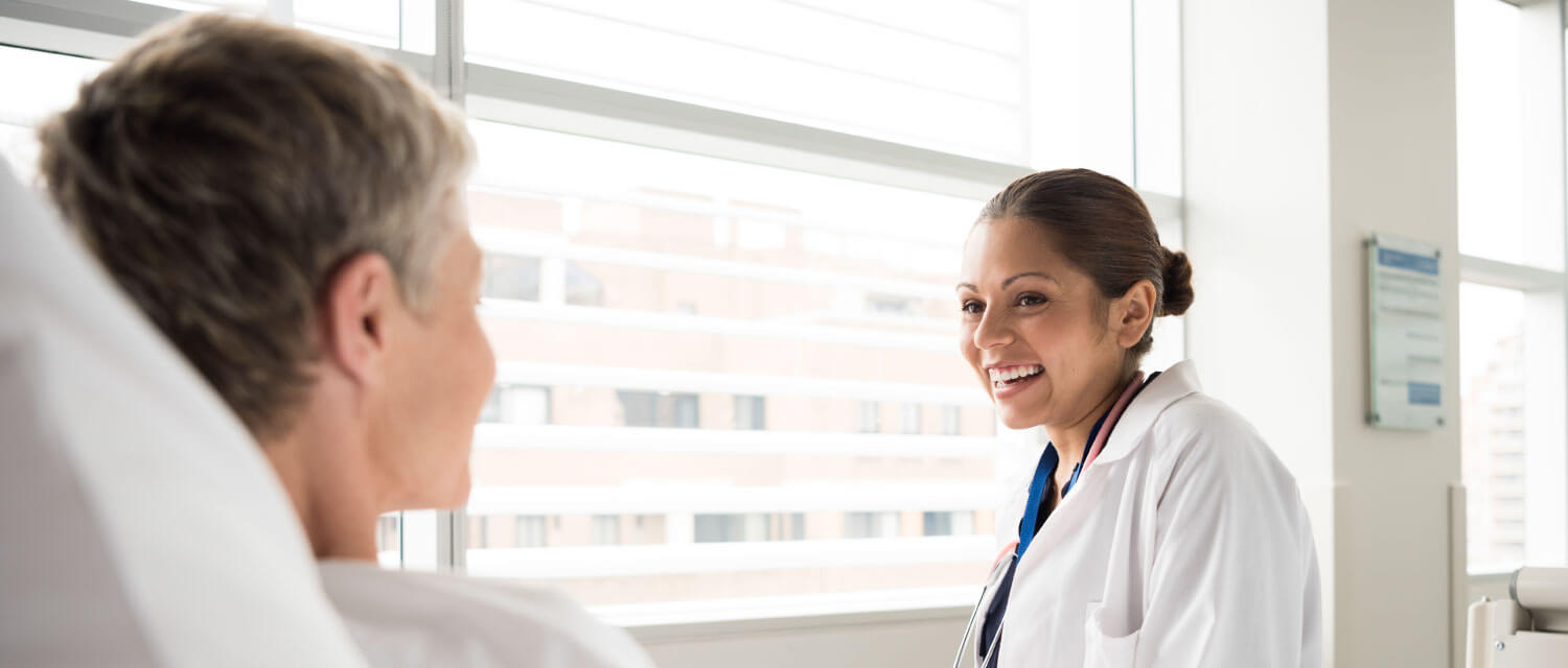 Smiling clinician Wellbeing First Champion image